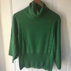 Kelly green sweater.